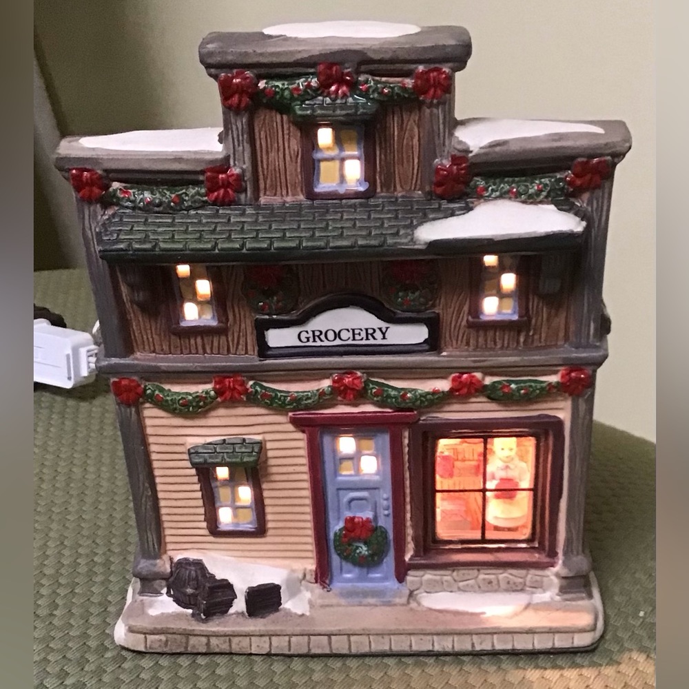 Vintage lighted Holiday Village Grocery Store. Amazing detail. Great con…